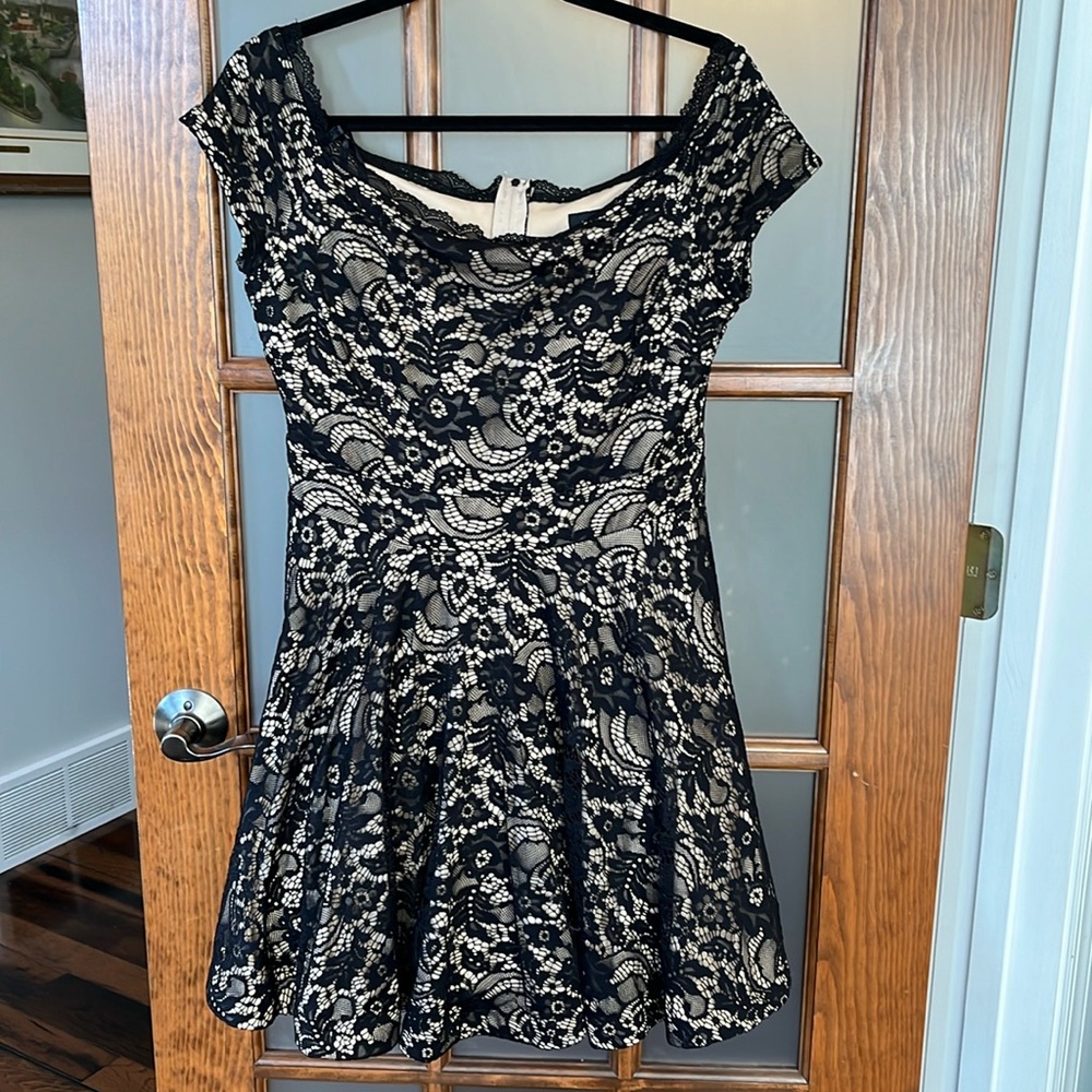 B. Darlin formal dress size 13/14.  Black lace with nude underlay.